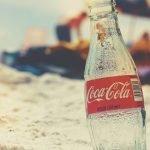 Coca-Cola bottle on beach