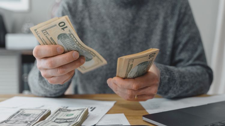 person counting money